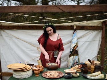Helen Hastings of the Magnus Viking association makes butter as the re-enactment of Saint Patrick's first landing in Ireland takes place at Inch Abbey on March 11, 2018 in Downpatrick, Northern Ireland. The Irish annals for the fifth century date Patrick's arrival in Ireland in the year 432. The patron saint of Ireland's remains are believed to be buried nearby at Down Cathedral. Saint Patrick's Day is celebrated on the 17th of March.