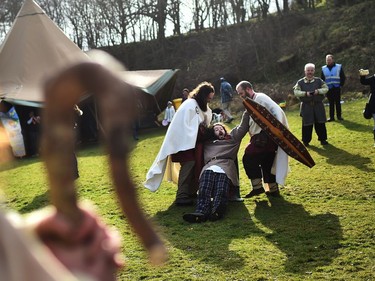 The druid Malachy played by Ciaron Davies is led away from Saint Patrick as the re-enactment of Saint Patrick's first landing in Ireland takes place at Inch Abbey on March 11, 2018 in Downpatrick, Northern Ireland. The Irish annals for the fifth century date Patrick's arrival in Ireland in the year 432. The patron saint of Ireland's remains are believed to be buried nearby at Down Cathedral. Saint Patrick's Day is celebrated on the 17th of March.