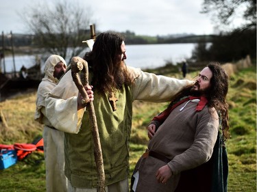 The druid Malachy played by Ciaron Davies interacts with Saint Patrick played by Marty Burns as the re-enactment of Saint Patrick's first landing in Ireland takes place at Inch Abbey on March 11, 2018 in Downpatrick, Northern Ireland. The Irish annals for the fifth century date Patrick's arrival in Ireland in the year 432. The patron saint of Ireland's remains are believed to be buried nearby at Down Cathedral. Saint Patrick's Day is celebrated on the 17th of March.