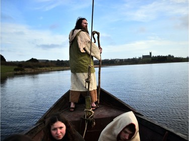 Marty Burns who plays Saint Patrick is brought to shore past Downpatrick cathedral as the re-enactment of Saint Patrick's first landing in Ireland takes place at Inch Abbey on March 11, 2018 in Downpatrick, Northern Ireland. The Irish annals for the fifth century date Patrick's arrival in Ireland in the year 432. The patron saint of Ireland's remains are believed to be buried at Down Cathedral. Saint Patrick's Day is celebrated on the 17th of March.
