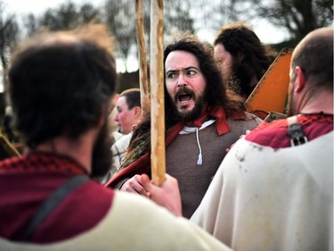 The druid Malachy played by Ciaron Davies interacts with Saint Patrick as the re-enactment of Saint Patrick's first landing in Ireland takes place at Inch Abbey on March 11, 2018 in Downpatrick, Northern Ireland. The Irish annals for the fifth century date Patrick's arrival in Ireland in the year 432. The patron saint of Ireland's remains are believed to be buried nearby at Down Cathedral. Saint Patrick's Day is celebrated on the 17th of March.