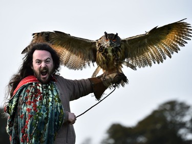 The druid Malachy played by Ciaron Davies interacts with 'Cracker' a european eagle owl as the re-enactment of Saint Patrick's first landing in Ireland takes place at Inch Abbey on March 11, 2018 in Downpatrick, Northern Ireland. The Irish annals for the fifth century date Patrick's arrival in Ireland in the year 432. The patron saint of Ireland's remains are believed to be buried nearby at Down Cathedral. Saint Patrick's Day is celebrated on the 17th of March.