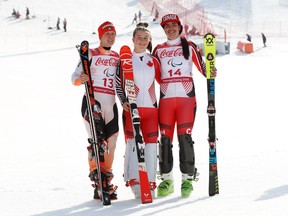 Gold medallist Mollie Jepsen stands between silver medallist Andrea Rothfuss of Germany and fellow Canadian bronze medallist Alana Ramsay after the alpine skiing women's super combined (standing) competition on Tuesday.