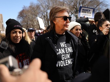NEW YORK, NY - MARCH 24:  Sir Paul McCartney joins thousands of people, many of them students, march against gun violence in Manhattan during the March for Our Lives rally on March 24, 2018 in New York, United States. More than 800 March for Our Lives events, organized by survivors of the Parkland, Florida school shooting on February 14 that left 17 dead, are taking place around the world to call for legislative action to address school safety and gun violence.
