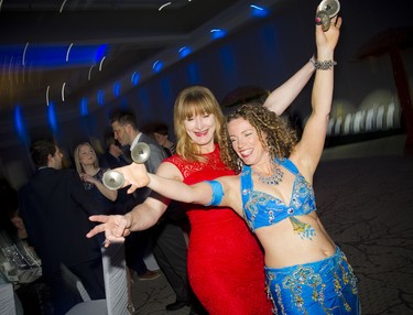 Jennifer Beecker, a bellydance performer, was showing Donna Safiya some moves during the soirée.