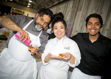 From left, Coconut Lagoon chef Joe Thottungal, Keyang Zhang and Varun Narayan.