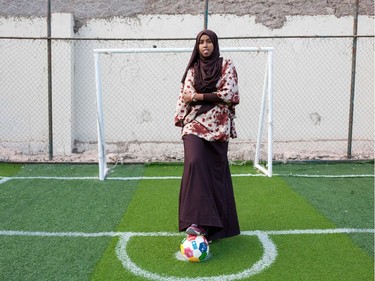 To mark the occasion of International Women's Day on March 8, 2018 AFP presents a series of 45 photos depicting women performing roles or working in professions more traditionally held by men.  More images can be found in www.afpforum.com  Search SLUG  "WOMEN-DAY -PACKAGE".  Somali football coach and player Marwa Mauled Abdi, 24, poses at the football ground of Ubah fitness center, the first football field exclusively opened for women, in Hargeisa, the capital of Somaliland, northwestern Somalia, on March 1, 2018. In the ring, battling flames or lifting off into space, women have entered professions generally considered as men's jobs. For International Women's Day, AFP met with women breaking down the barriers of gender-bias in the work world.