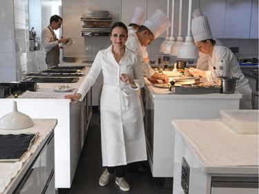 To mark the occasion of International Women's Day on March 8, 2018 AFP presents a series of 45 photos depicting women performing roles or working in professions more traditionally held by men.  More images can be found in www.afpforum.com  Search SLUG  "WOMEN-DAY -PACKAGE".  French chef Anne-Sophie Pic, the only female three-starred Michelin chef in France and one of a handful in the world, poses on March 2, 2018 in the kitchen of her restaurant "La maison Pic" in Valence, southeastern France.    In the ring, battling flames or lifting off into space, women have entered professions generally considered as men's jobs. For International Women's Day, AFP met with women breaking down the barriers of gender-bias in the work world.