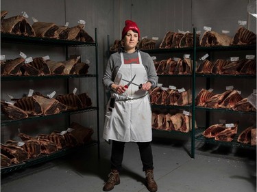 To mark the occasion of International Women's Day on March 8, 2018 AFP presents a series of 45 photos depicting women performing roles or working in professions more traditionally held by men.  More images can be found in www.afpforum.com  Search SLUG  "WOMEN-DAY -PACKAGE".  Heather Marold Thomason, butcher and founder of Primal Supply Meats, poses for a picture in her company's dry-aging room on March 2, 2018, in Lansdowne, Pennsylvania. In the ring, battling flames or lifting off into space, women have entered professions generally considered as men's jobs. For International Women's Day, AFP met with women breaking down the barriers of gender-bias in the work world.