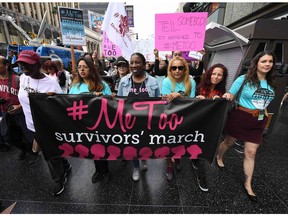 Women who are survivors of sexual harassment, sexual assault, sexual abuse and their supporters protest during a #MeToo march in Hollywood Nov. 12, 2017