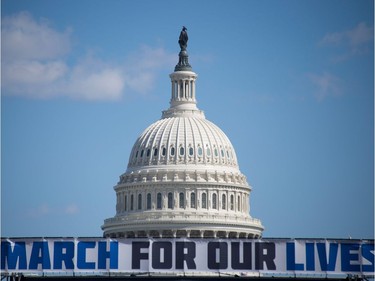 TOPSHOT - The March For Our Lives stage sign is seen near the capitol ahead of the anti-gun rally in Washington, DC, on March 23, 2018.