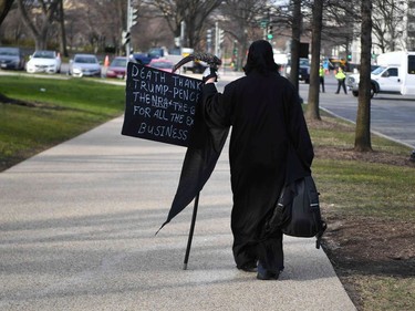 TOPSHOT - People arrive early for the March For Our Lives rally against gun violence in Washington, DC on March 24, 2018. Galvanized by a massacre at a Florida high school, hundreds of thousands of Americans are expected to take to the streets in cities across the United States on Saturday in the biggest protest for gun control in a generation.