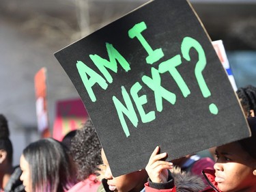 TOPSHOT - People arrive for the March For Our Lives rally against gun violence in Washington, DC on March 24, 2018. Galvanized by a massacre at a Florida high school, hundreds of thousands of Americans are expected to take to the streets in cities across the United States on Saturday in the biggest protest for gun control in a generation.