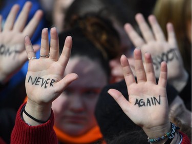 Participants arrive for the March for Our Lives Rally in Washington, DC on March 24, 2018.  Galvanized by a massacre at a Florida high school, hundreds of thousands of Americans are expected to take to the streets in cities across the United States on Saturday in the biggest protest for gun control in a generation.