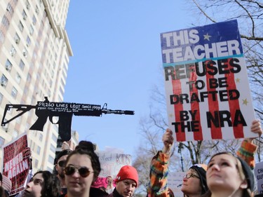 Participants take part in the March for Our Lives Rally in New York on March 24, 2018.  Bundled against the cold but fired up with passion after a Florida high school massacre, crowds gathered in Washington on Saturday for what is expected to be the biggest US gun control protest in a generation, with hundreds of thousands attending.The student-organized protest is to feature rallies from coast to coast, with the main event in Washington within sight of the US Capitol -- whose lawmakers the protesters hope to influence.