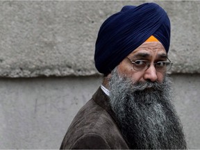 Inderjit Singh Reyat, the only man ever convicted in the Air India bombings of 1985, waits outside B.C. Supreme Court in Vancouver on Sept. 10, 2010. He has never expressed remorse.