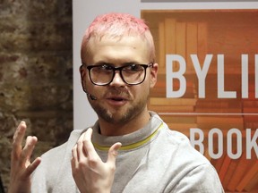 Chris Wylie, from Canada, who once worked for the UK-based political consulting firm Cambridge Analytica, gives a talk at the Frontline Club in London, Tuesday, March 20, 2018. Cambridge Analytica has been accused of improperly using information from more than 50 million Facebook accounts. It denies wrongdoing. Wylie has been quoted as saying the company used the data to build psychological profiles so voters could be targeted with ads and stories.