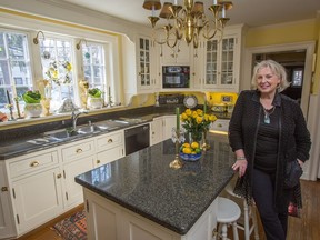 Architect Sarah Murray, seen here in the kitchen ofher 100-year-old cottage in Rockliffe.