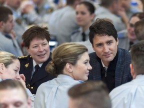 Brenda Lucki, commanding officer of Depot Division, left, and Prime Minister Justin Trudeau, chat over breakfast at RCMP depot in Regina on Thursday January 26, 2017. Justin Trudeau is expected Friday to put a woman in charge of the RCMP, signalling a culture change in the national police force which has been beset by complaints about sexual harassment and discrimination against female officers.