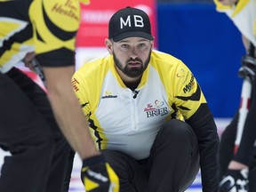 Manitoba skip Reid Carruthers watches a rock during a Friday game against Nova Scotia.