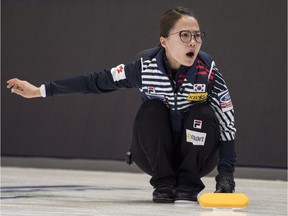 South Korean skip Kim Eunjung directs the sweepers during a game against Germany during the World Women's Curling Championship round-robin at North Bay.