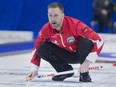 Team Canada skip Brad Gushue directs the sweep against Ontario in the 1 vs. 2 playoff at the Tim Hortons Brier at the Brandt Centre in Regina on Saturday night.