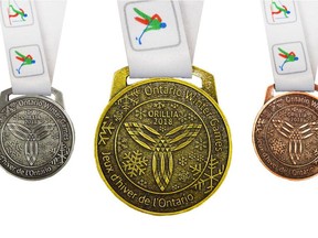 Medals from the Ontario Winter Games. The flawed French translation of the athletes oath is on the back of the medals, not shown here.