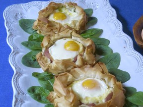 This March 2018 photo shows eggs baked in pastry nests made of phyllo in New York. This dish is from a recipe by Sara Moulton. (Sara Moulton via AP) ORG XMIT: NYSM101