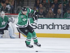 Files: Jason Spezza #90 of the Dallas Stars handles the puck against the Ottawa Senators at the American Airlines Center on November 24, 2015 in Dallas, Texas.