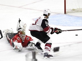 Anthony Duclair, then with the Coyotes, avoids a diving attempt by Senators goaltender Mike Condon on the way to scoring a tying game in the game on Nov. 18.