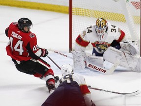 Senators centre Jean-Gabriel Pageau (44) is tripped by Panthers defenceman Mike Matheson (19), resulting in a penalty shot in overtime of Thursday's game.