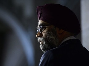 Minister of National Defence Minister Harjit Sajjan takes part in a press conference on Canada's peacekeeping mission to Mali in the foyer of the House of Commons on Parliament Hill in Ottawa Monday, March 19, 2018.