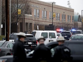 Deputies and federal agents converge on Great Mills High School, the scene of a shooting, Tuesday morning, March 20, 2018 in Great Mills, Md.