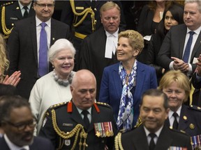 Ontario Lt.-Governor Elizabeth Dowdeswell, left, and Ontario Premier Kathleen Wynne enter the Legislative Chamber before the Throne Speech at Queens Park, in Toronto on Monday, March 19, 2018.