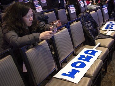 A Doug Ford supporter waits for the Ontario PC leadership announcement in Markham, Ont., on Saturday, March 10, 2018.