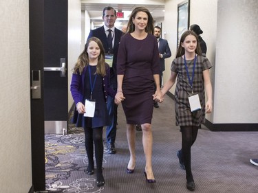 Candidate Caroline Mulroney walks with her family as she makes her way to listen to introduction speeches during the Ontario Progressive Conservative Leadership announcement in Markham, Ont. on Saturday, March 10, 2018.