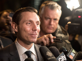Patrick Brown leaves the Ontario PC Party Head Offices in Toronto on Feb. 20, 2018.