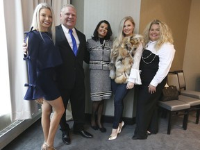 PC candidate Doug Ford with his wife Karla (R) and daughters Kyla (L), Kayla and Kara (far right) and daughters at the  Ontario PC leadership convention on Saturday March 10, 2018. Jack Boland/Toronto Sun/Postmedia Network