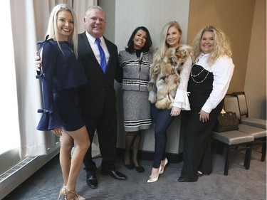 PC candidate Doug Ford with his wife Karla, right, and daughters Kyla, left, Kayla and Kara, far right, at the  Ontario PC leadership convention on Saturday March 10, 2018.
