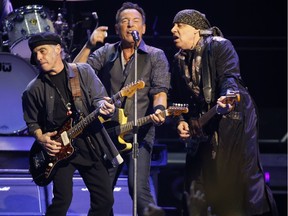 Nils Lofgren, left, performs with Bruce Springsteen and Steven Van Zandt during a show in Toronto in February 2016. Jack Boland/Postmedia