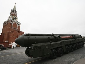 File photo: Russian Topol M intercontinental ballistic missile launcher rolls along Red Square.