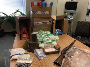Police seized more than 55,000 methamphetamine pills, one kilogram of cocaine, more than five kilos of hashish, and marijuana, cash, weapons, contraband cigarettes and other drug trafficking equipment in a raid on an Embrun property.