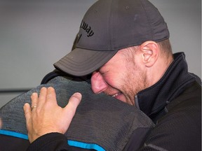 Stuntman Stu Schwartz, right, meets his bone marrow donor, David Levi of Israel at the Ottawa airport.