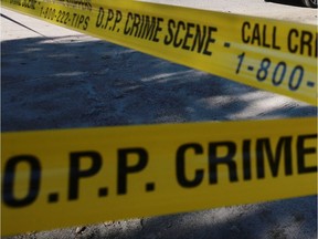 Police tape surrounds a home where police say one person was shot to death at 37 Szczipior Rd. in Wilno (Ontario), Tuesday, September 22, 2015. Police arrested a man in Ottawa after a day long manhunt for a person of interest. Mike Carroccetto / Ottawa Citizen