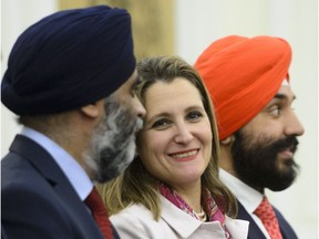 Minister of National Defence Minister Harjit Singh Sajjan, left to right, Minister of Foreign Affairs Chrystia Freeland, and Innovation, Science and Economic Development Minister Navdeep Singh Bains attend a press conference at Hyderabad House in New Delhi, India on Feb. 23.