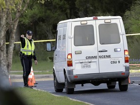 A police crime scene van arrives near the site of Sunday's explosion, Monday, March 19, 2018, in Austin, Texas. Police warned nearby residents to remain indoors overnight as investigators looked for possible links to other deadly package bombings elsewhere in the city this month.