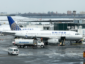 File photo of United Airlines jets on the tarmac at LaGuardia Airport in New York.