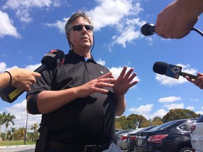 Joe Smitha of Palm Harbor, Fla., speaks with reporters on Saturday, March 17, 2018, about his niece, Alexa Duran, whose family has identified her as one of at least six victims of a bridge collapse near the Florida International University campus in the Miami area on March 15, 2018. (AP Photo/Jennifer Kay)