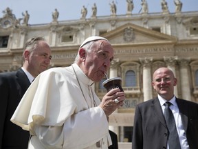 FILE - In tis April 6, 2016 file photo, Pope Francis drinks from a mate gourd at the end of his weekly general audience, in St. Peter's Square at the Vatican. Tuesday, March 13, 2018 marks five years of Pope Francis' pontificate, in these five years, the world has gotten to know Jorge Mario Bergoglio, the son of Italian immigrants to Argentina who was so self-deprecating that when he emerged on the loggia of St. Peter's Basilica on March 13, 2013, as Pope Francis, he quipped that his brother cardinals had to search to the "end of the Earth" to find a new leader.