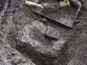 Dozens of ancient footprints, one of which is shown at the dig site on a British Columbia island, have been confirmed as the earliest known of their kind in North America. Researchers at the University of Victoria's Hakai Institute say they've found a total of 29 fossilized footprints, buried deep below a beach on Calvert Island off the province's central coast. THE CANADIAN PRESS/HO-University of Victoria